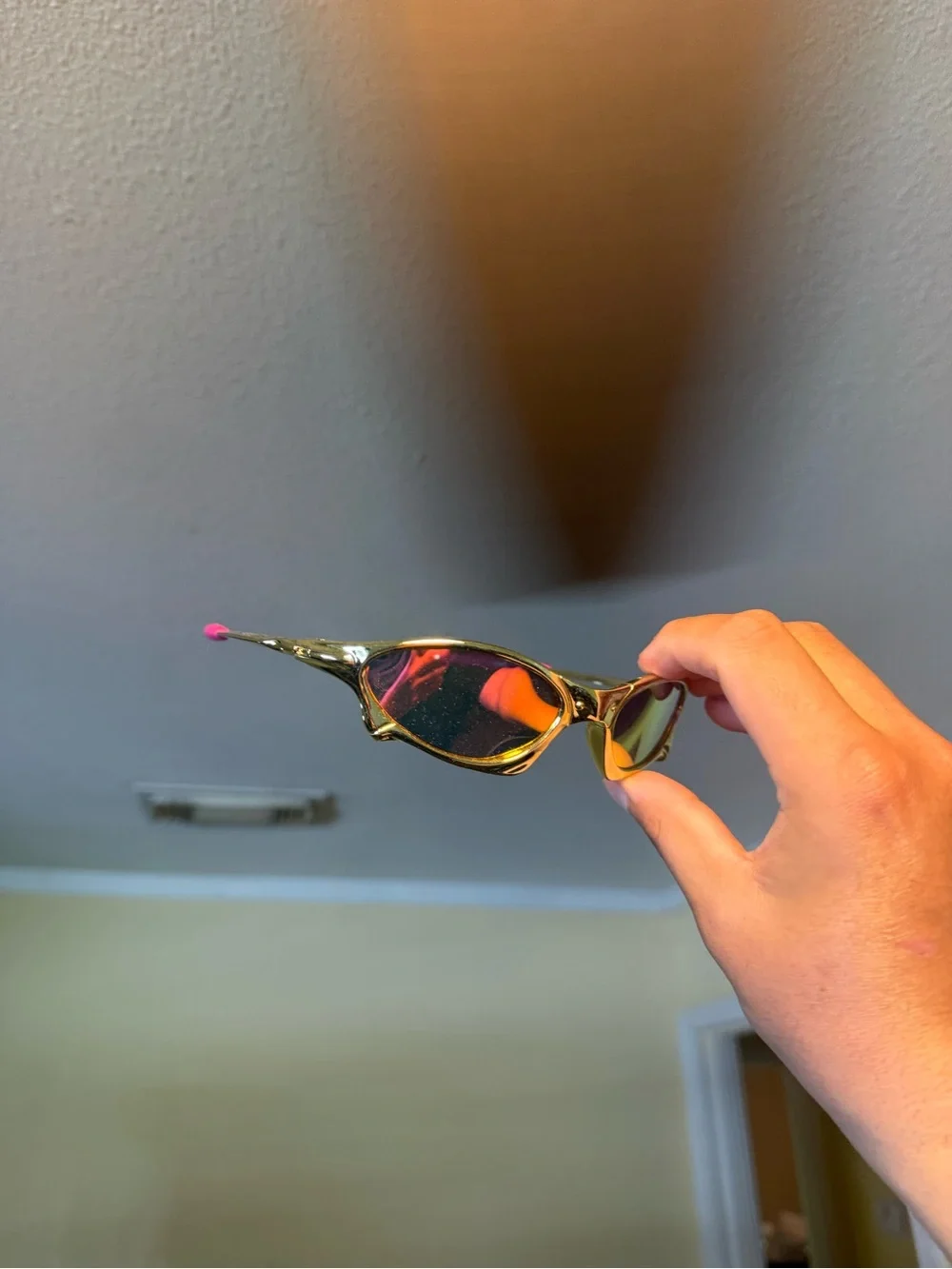 Sporty Wrap Sunglasses with Pink Temple Tips Oakleys